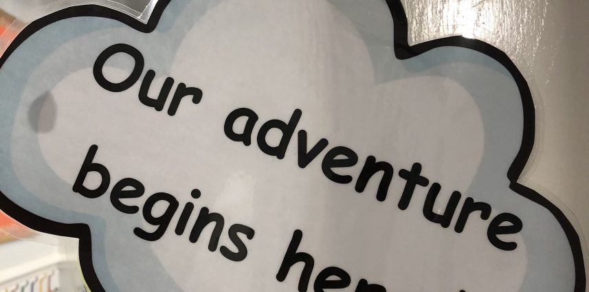 a bubble that says our adventure begins here